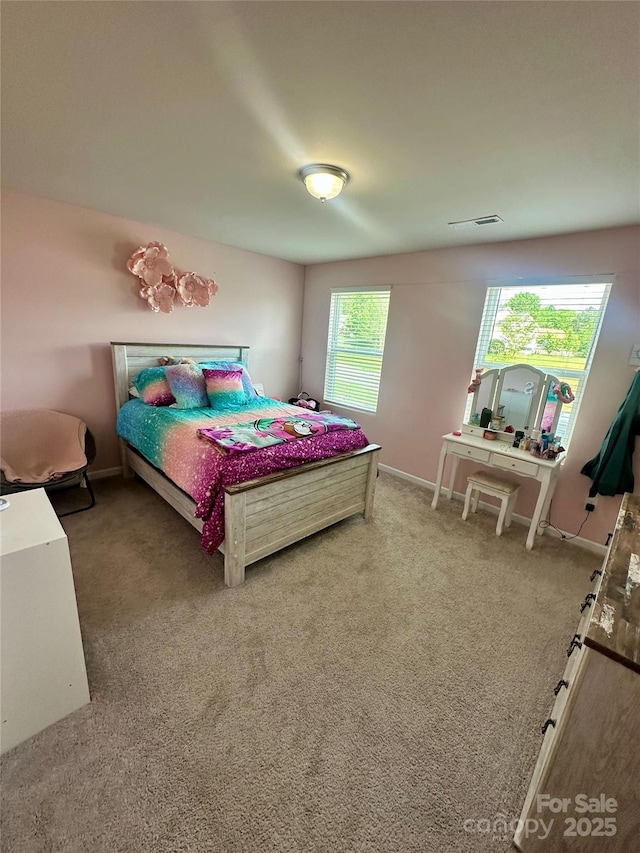 1070 Glenbriar Ct, Woodleaf, NC 27054 - carpeted bedroom with visible vents and baseboards