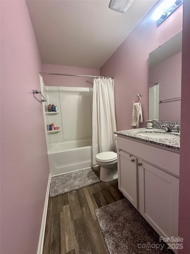 1070 Glenbriar Ct, Woodleaf, NC 27054 - bathroom with shower / bath combo, vanity, toilet, visible vents, and wood finished floors