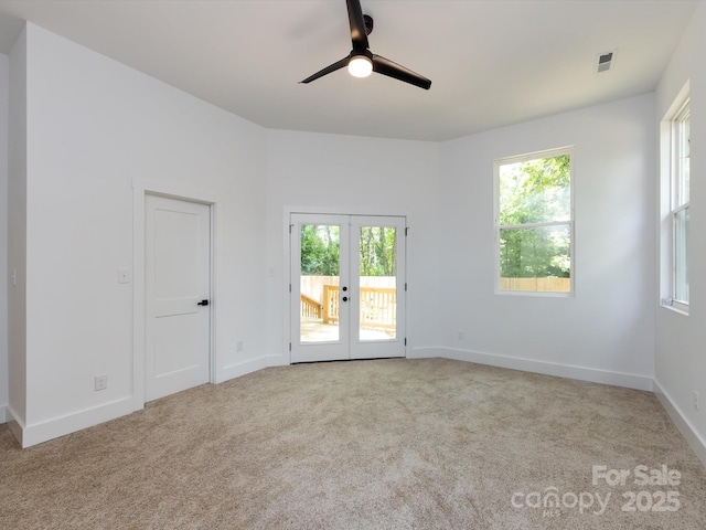 3007 W Blvd, Charlotte, NC 28208 - spare room with french doors, ceiling fan, healthy amount of natural light, and carpet