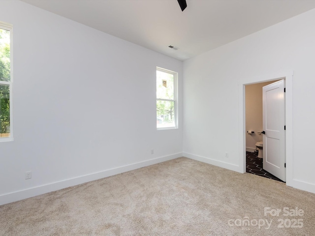 3007 W Blvd, Charlotte, NC 28208 - spare room featuring carpet flooring, plenty of natural light, and baseboards