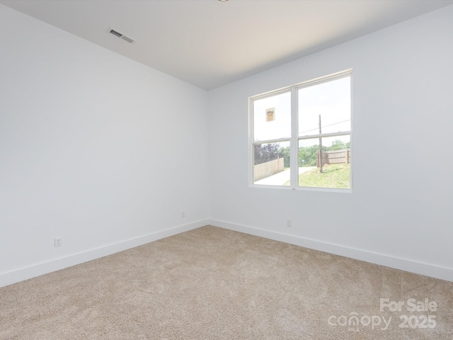 3007 W Blvd, Charlotte, NC 28208 - carpeted empty room featuring baseboards