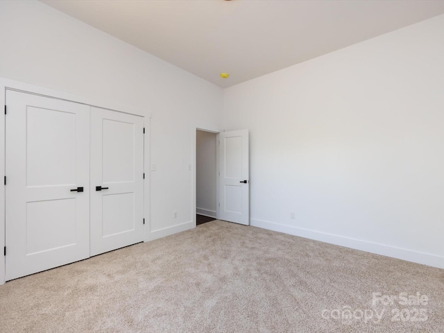 3007 W Blvd, Charlotte, NC 28208 - unfurnished bedroom featuring carpet floors, baseboards, and a closet