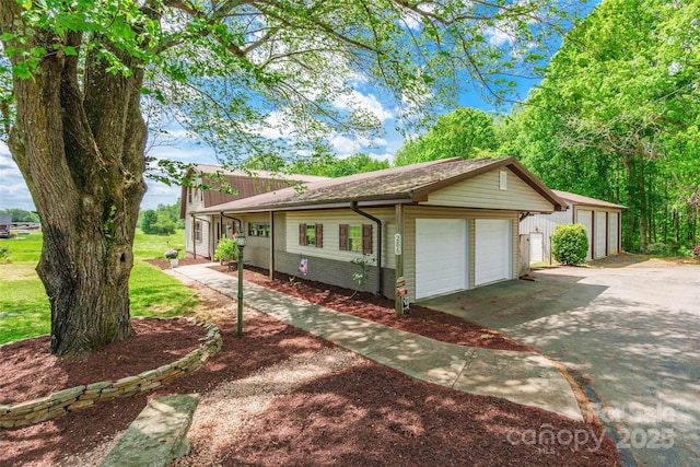 view of front of property with a garage