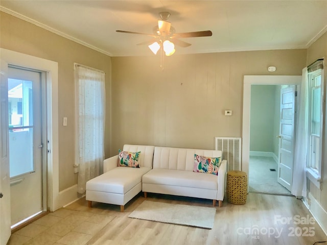 439 17th St, Cramerton, NC 28032 - living room with wood finished floors, ceiling fan, and ornamental molding