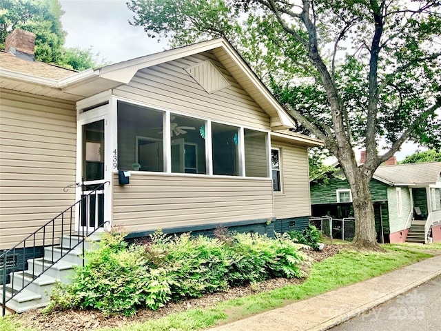 439 17th St, Cramerton, NC 28032 - view of property exterior featuring entry steps and a sunroom