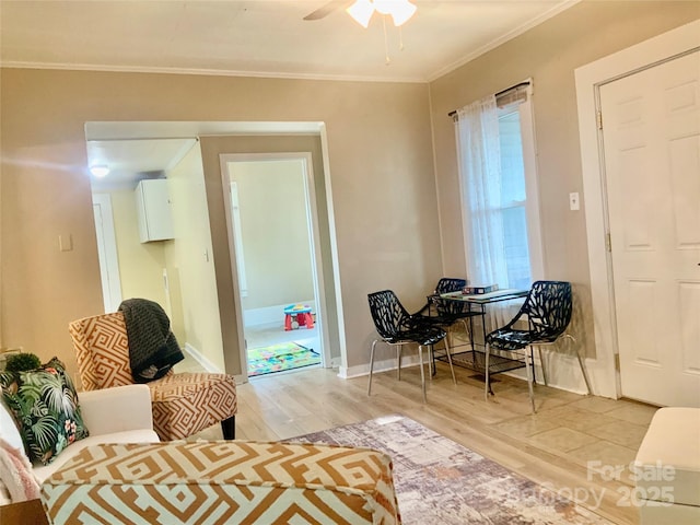 439 17th St, Cramerton, NC 28032 - sitting room featuring light wood-style flooring, a ceiling fan, ornamental molding, and baseboards