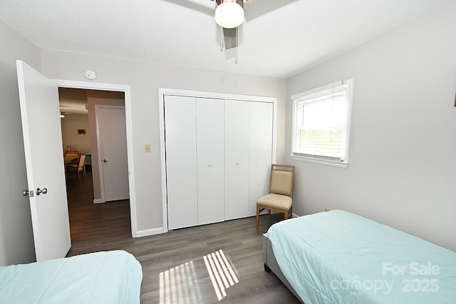 2263 Starbrooke Dr, Newton, NC 28658 - bedroom with a ceiling fan, a closet, and wood finished floors