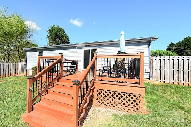 2263 Starbrooke Dr, Newton, NC 28658 - wooden terrace with a fenced backyard, stairs, and a lawn