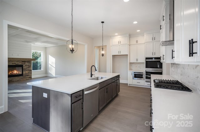 515 Edmunds Ln Unit 38, Clover, SC 29710 - kitchen with a sink, stainless steel appliances, recessed lighting, wood finished floors, and white cabinets
