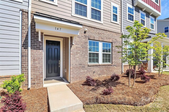 147 Morning Gap Pkwy, Fort Mill, SC 29715 - doorway to property with brick siding