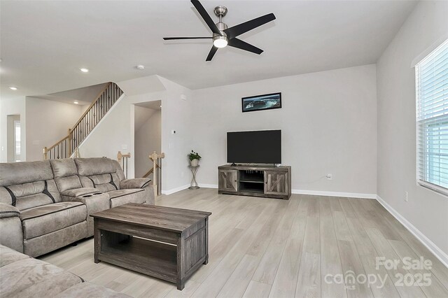 147 Morning Gap Pkwy, Fort Mill, SC 29715 - living room with ceiling fan, a healthy amount of sunlight, and light wood-style flooring