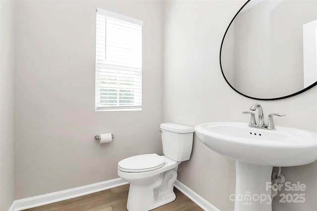 147 Morning Gap Pkwy, Fort Mill, SC 29715 - bathroom with baseboards, wood finished floors, and toilet