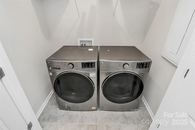 147 Morning Gap Pkwy, Fort Mill, SC 29715 - laundry area with separate washer and dryer, baseboards, and laundry area