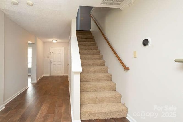 1965 Leesburg Dr, Clover, SC 29710 - stairway with baseboards and wood finished floors