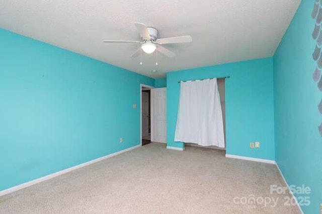 1965 Leesburg Dr, Clover, SC 29710 - carpeted empty room with baseboards and ceiling fan