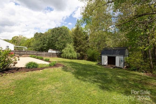 1965 Leesburg Dr, Clover, SC 29710 - view of yard with a patio, an outbuilding, fence, and a storage shed