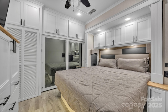 bedroom featuring crown molding, light wood-style floors, recessed lighting, and a ceiling fan
