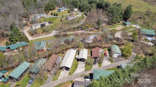 aerial view of property and surrounding area