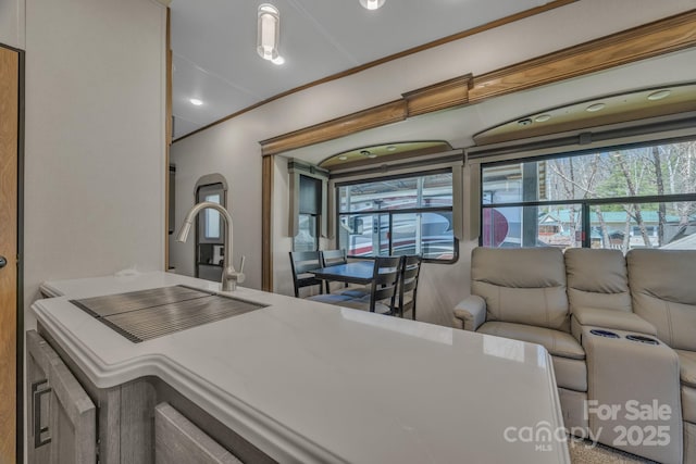 kitchen with plenty of natural light, open floor plan, and recessed lighting
