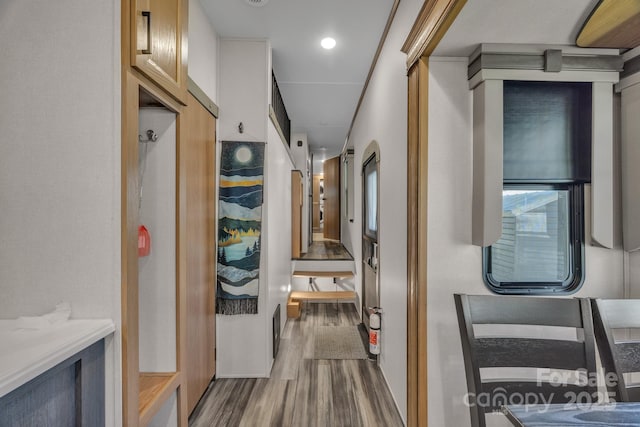 hall featuring wood finished floors