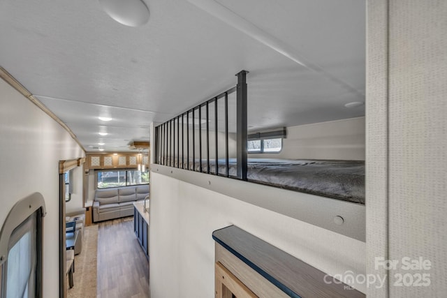 hallway featuring wood finished floors