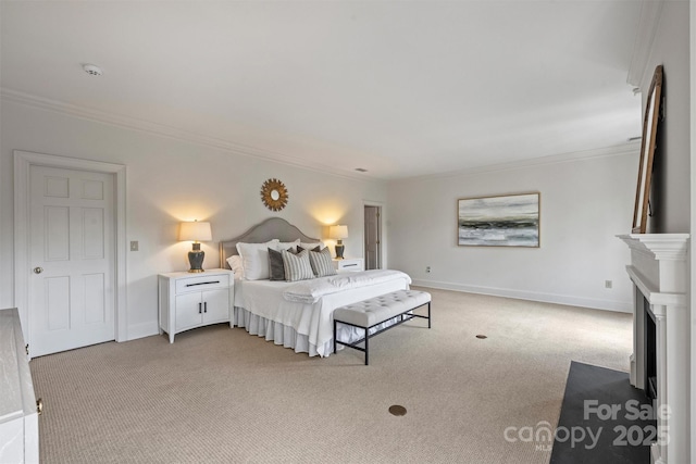bedroom with a fireplace with flush hearth, light carpet, crown molding, and baseboards