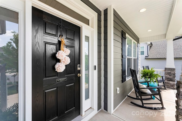 entrance to property with covered porch