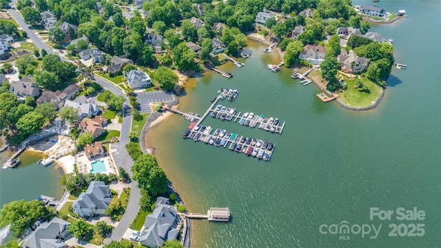 bird's eye view with a water view