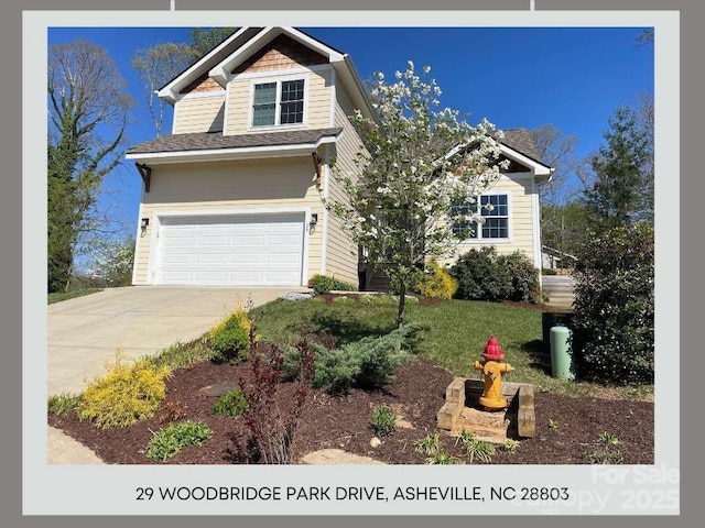 29 Woodbridge Park Dr, Asheville, NC 28803 - view of front of property with an attached garage and driveway
