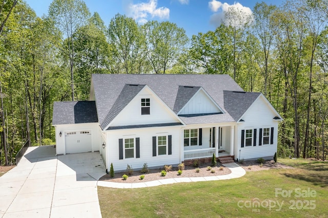 modern farmhouse style home with roof with shingles, an attached garage, a front yard, concrete driveway, and covered porch