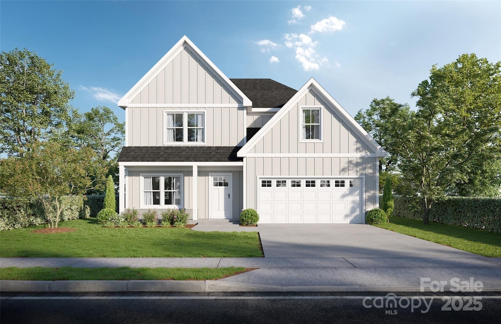 modern inspired farmhouse featuring board and batten siding, a front yard, driveway, and roof with shingles