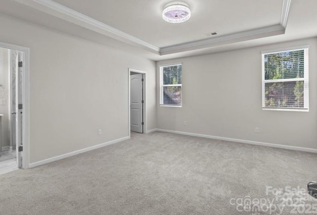 5024 Colline Ct, Charlotte, NC 28216 - unfurnished bedroom with a raised ceiling, crown molding, carpet floors, multiple windows, and baseboards