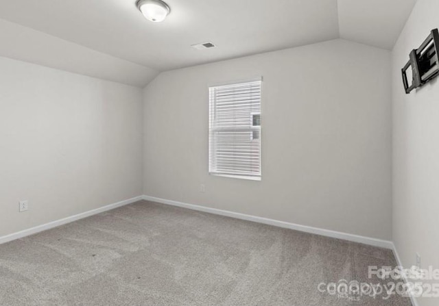 5024 Colline Ct, Charlotte, NC 28216 - bonus room with vaulted ceiling, carpet, and baseboards