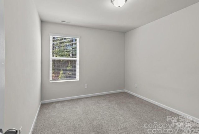 5024 Colline Ct, Charlotte, NC 28216 - empty room with carpet flooring and baseboards
