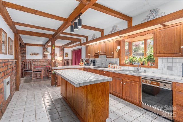 22 Waynewood Dr, Waynesville, NC 28786 - kitchen with black electric cooktop, tile counters, dishwasher, and a sink