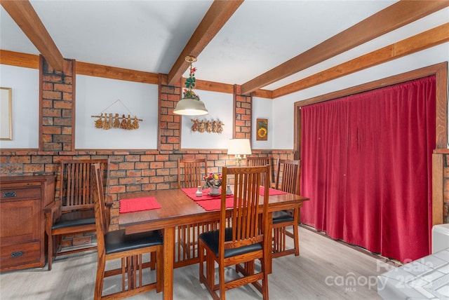 22 Waynewood Dr, Waynesville, NC 28786 - dining space with beam ceiling and wood finished floors