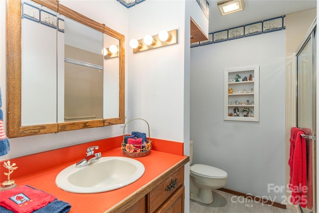 22 Waynewood Dr, Waynesville, NC 28786 - full bathroom featuring toilet, a shower with door, and vanity