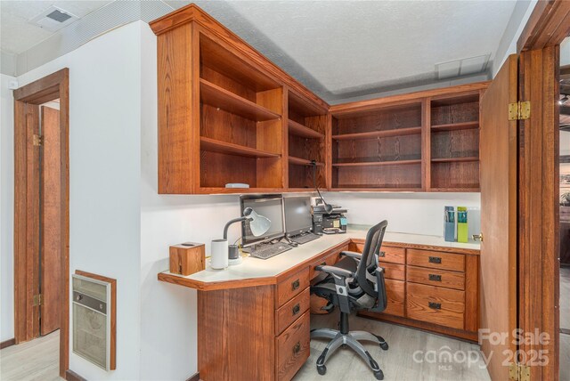 22 Waynewood Dr, Waynesville, NC 28786 - office space featuring visible vents, built in study area, and light wood-type flooring