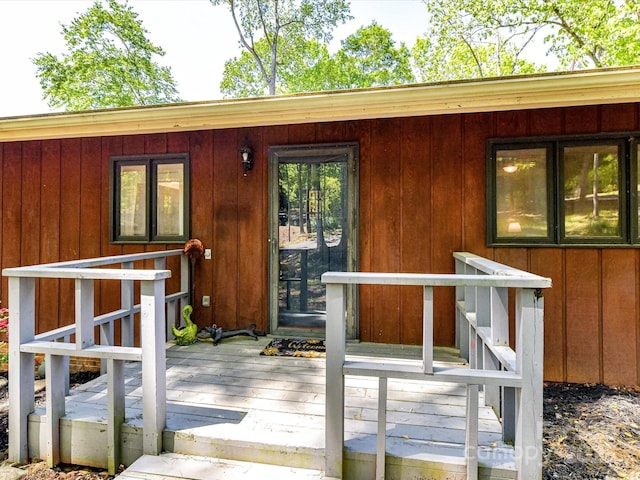 1278 Island Creek Dr, Troy, NC 27371 - property entrance with board and batten siding and a deck
