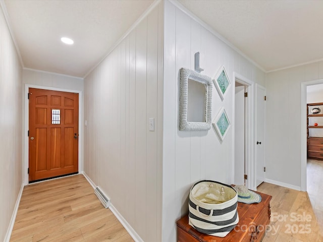 1278 Island Creek Dr, Troy, NC 27371 - doorway featuring visible vents, light wood-style floors, and ornamental molding