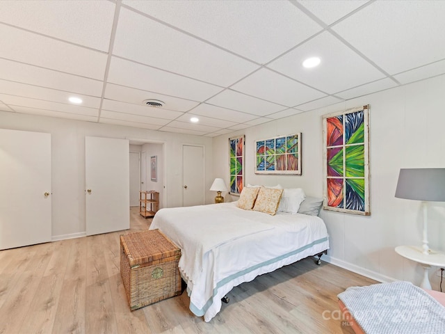 1278 Island Creek Dr, Troy, NC 27371 - bedroom featuring wood finished floors, a drop ceiling, baseboards, visible vents, and recessed lighting