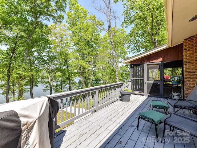 1278 Island Creek Dr, Troy, NC 27371 - wooden deck featuring a sunroom and area for grilling