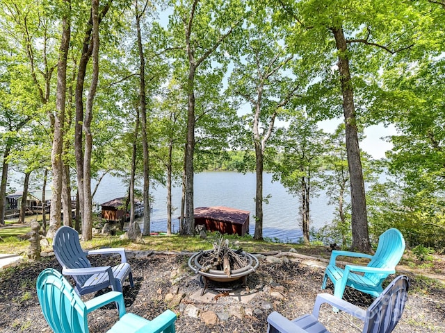 1278 Island Creek Dr, Troy, NC 27371 - view of yard with a boat dock, a water view, and an outdoor fire pit