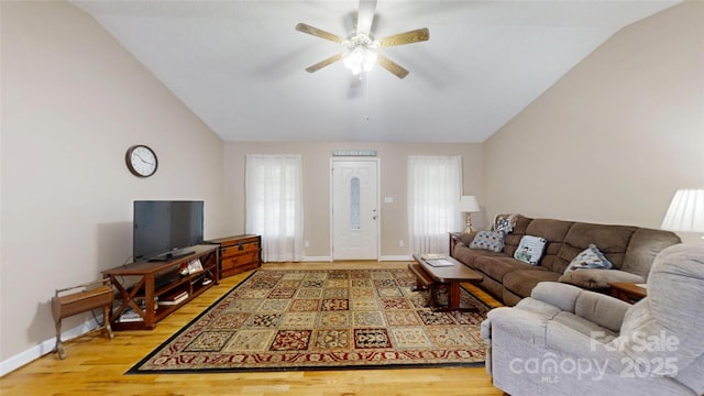 3124 Banks St, Lincolnton, NC 28092 - living area featuring lofted ceiling, a ceiling fan, light wood finished floors, healthy amount of natural light, and baseboards