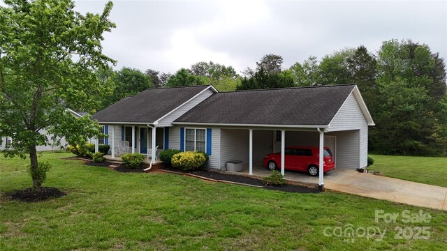 3124 Banks St, Lincolnton, NC 28092 - ranch-style home with concrete driveway, a front yard, covered porch, an attached carport, and roof with shingles