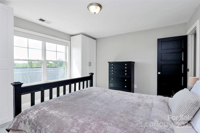 bedroom with visible vents