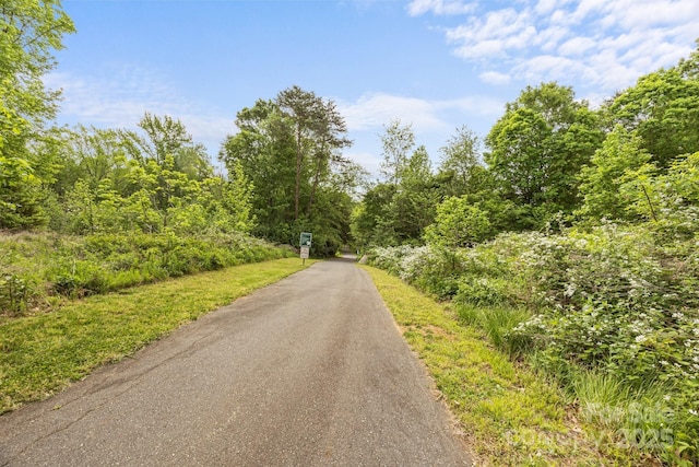view of street featuring a view of trees