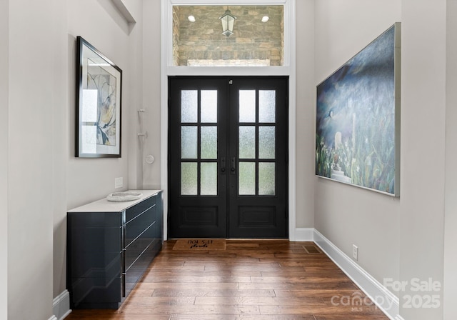 767 Pinnacle Dr, Iron Station, NC 28080 - entryway with a healthy amount of sunlight, baseboards, french doors, and wood finished floors