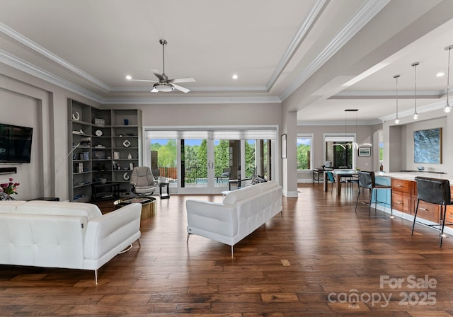 767 Pinnacle Dr, Iron Station, NC 28080 - living area featuring ornamental molding, dark wood finished floors, and ceiling fan