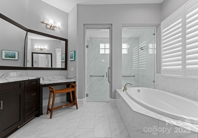 767 Pinnacle Dr, Iron Station, NC 28080 - full bathroom featuring vanity, marble finish floor, baseboards, a bath, and a stall shower